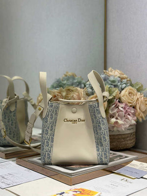 Dior Medium Signature Bucket Bag Blue Dior Oblique Chambray with Raffia Effect and Light Biscuit Smooth Calfskin - Default Title - View 1