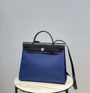 Hermes H082835CKAC Herbag Zip 31 Bag in Black Hunter Leather and Canvas H60029 - Default Title - View 1