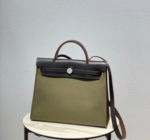 Hermes H082835CKAC Herbag Zip 31 Bag in Black Hunter Leather and Canvas H60032 - Default Title - View 1