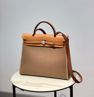 Hermes H082835CKAC Herbag Zip 31 Bag in Black Hunter Leather and Canvas H60036 - Default Title - View 1