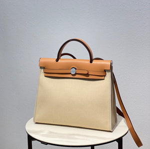 Hermes H082835CKAC Herbag Zip 31 Bag in Black Hunter Leather and Canvas H60038 - Default Title - View 1
