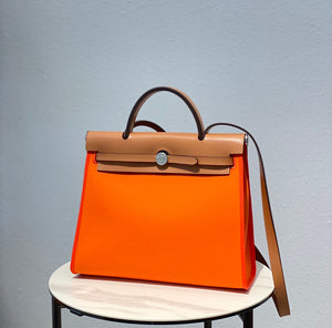 Hermes H082835CKAC Herbag Zip 31 Bag in Black Hunter Leather and Canvas H60039 - Default Title - View 1
