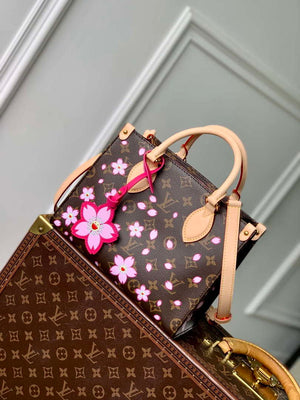 LV M13269 Louis Vuitton LV x TM OnTheGo PM Handbag Sakura Brown - Default Title - View 1