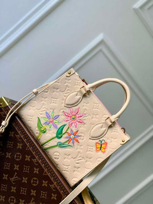 LV M21732 Louis Vuitton LV x YK OnTheGo PM Quartz - Default Title - View 1