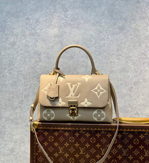 LV M46041 Louis Vuitton Madeleine MM Handbag Embossed Grained Cowhide Leather - Default Title - View 1
