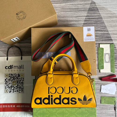 Adidas x Gucci 702397 mini duffle bag yellow
