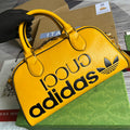 Adidas x Gucci 702397 mini duffle bag yellow
