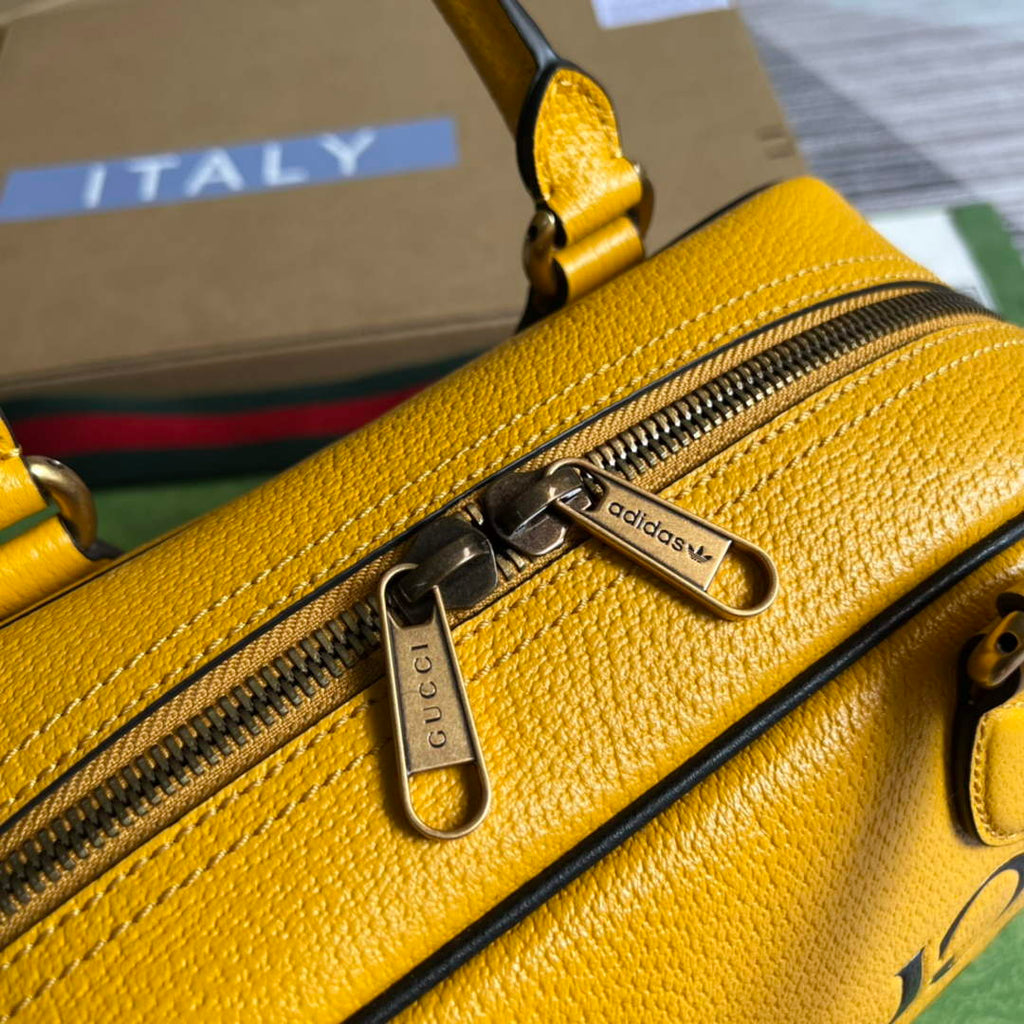 Adidas x Gucci 702397 mini duffle bag yellow