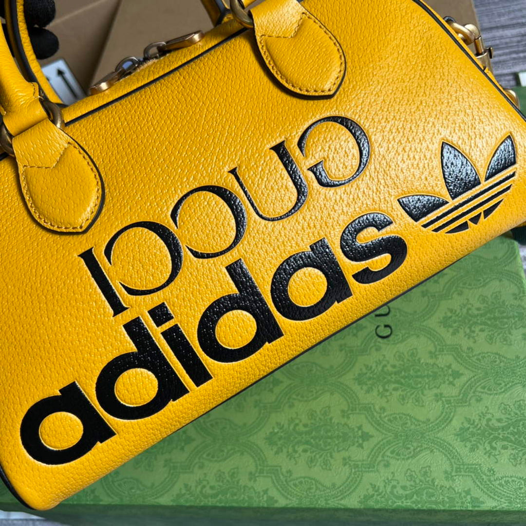 Adidas x Gucci 702397 mini duffle bag yellow