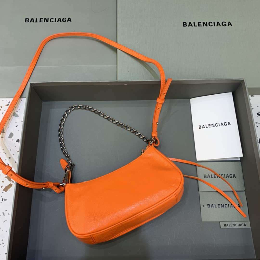 Balenciaga 6940271VG9 Le Cagole Mini Multipouch in Orange Arena lambskin