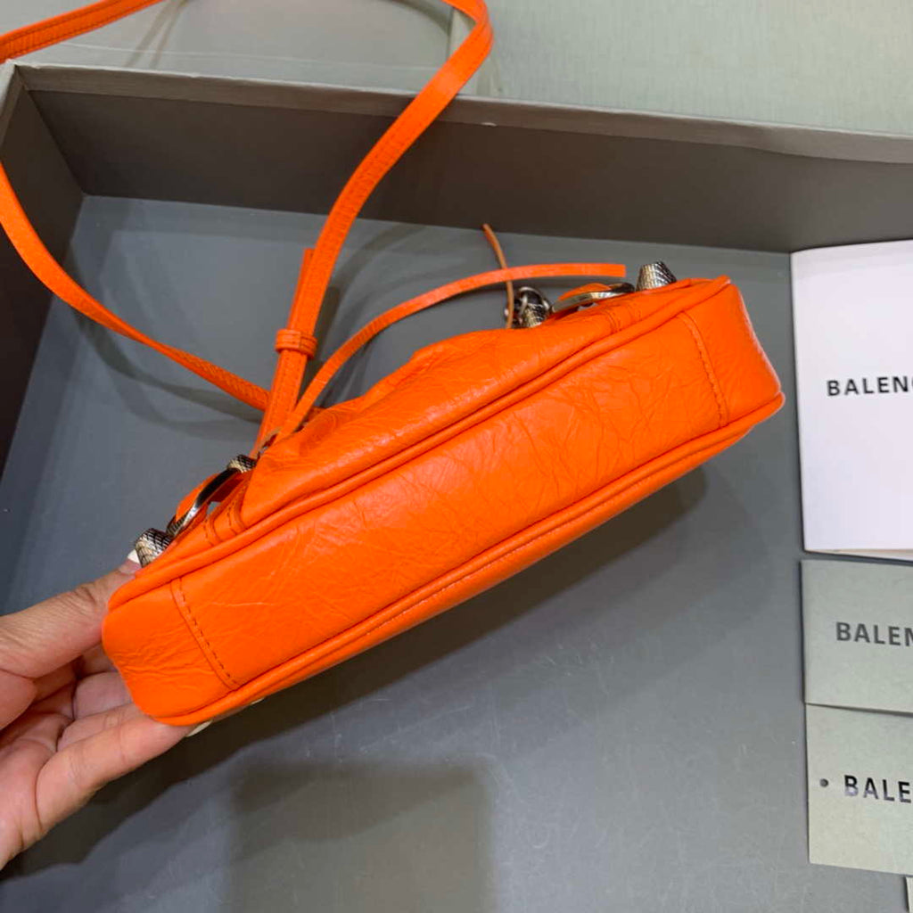Balenciaga 6940271VG9 Le Cagole Mini Multipouch in Orange Arena lambskin