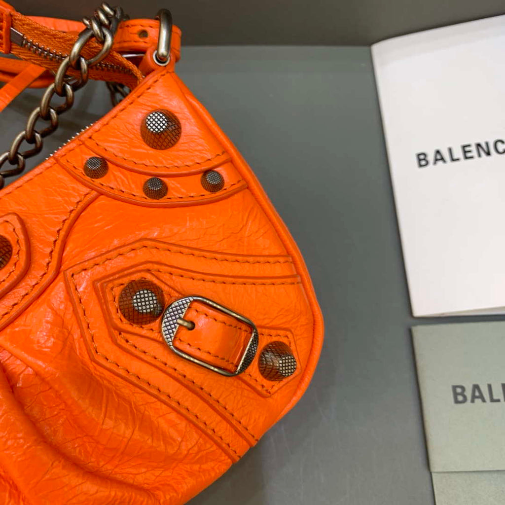 Balenciaga 6940271VG9 Le Cagole Mini Multipouch in Orange Arena lambskin