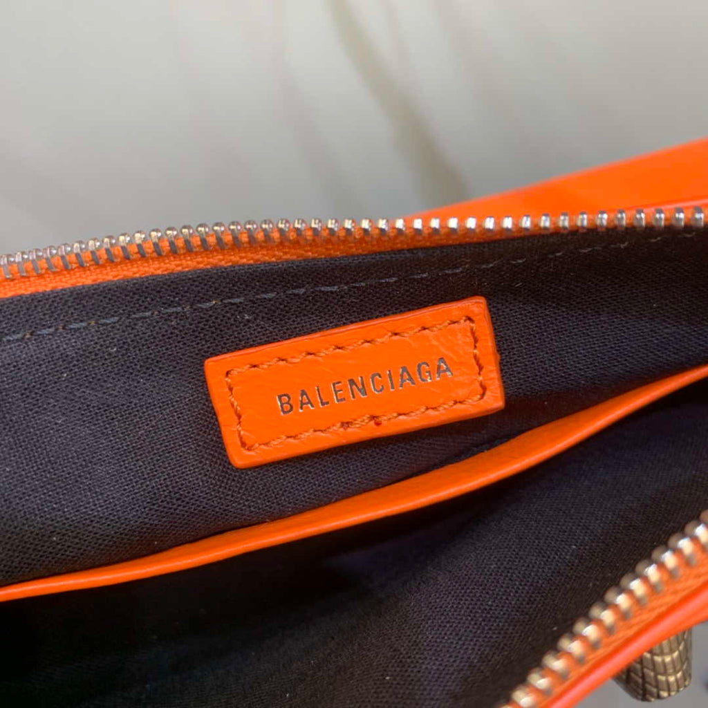 Balenciaga 6940271VG9 Le Cagole Mini Multipouch in Orange Arena lambskin