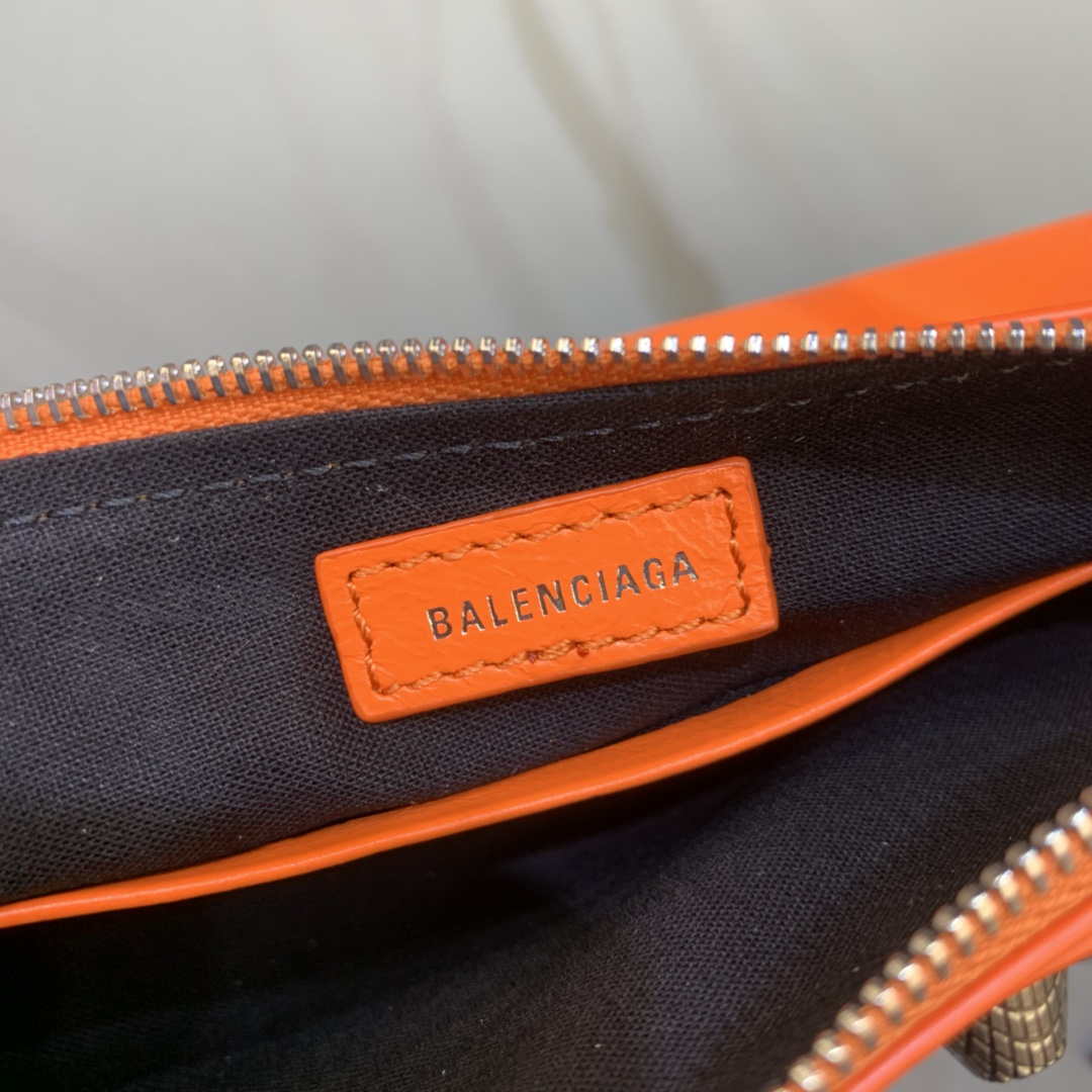 Balenciaga 6940271VG9 Le Cagole Mini Multipouch in Orange Arena lambskin