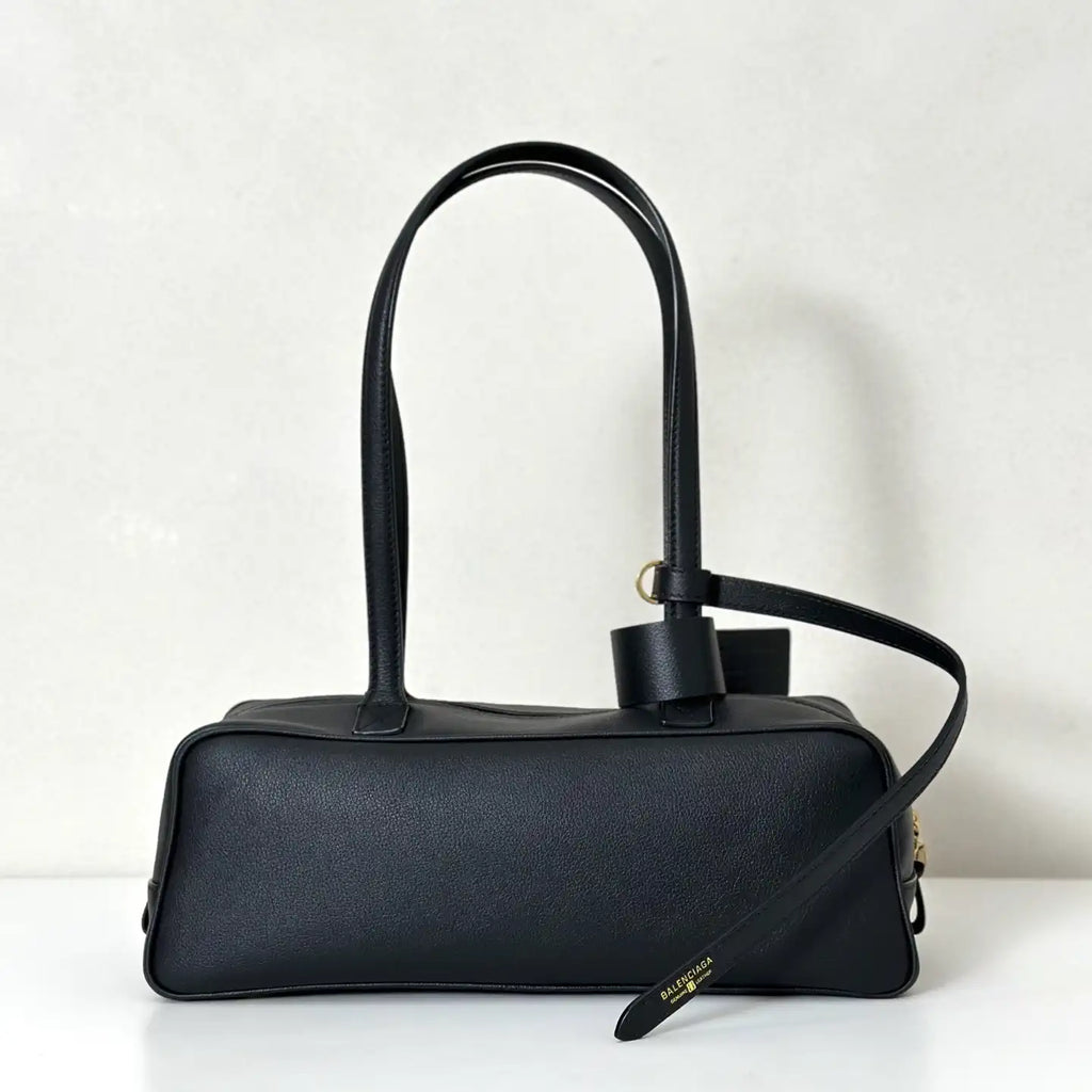 Balenciaga 8264252 Carrie Bowling Bag in black calfskin aged-gold hardware