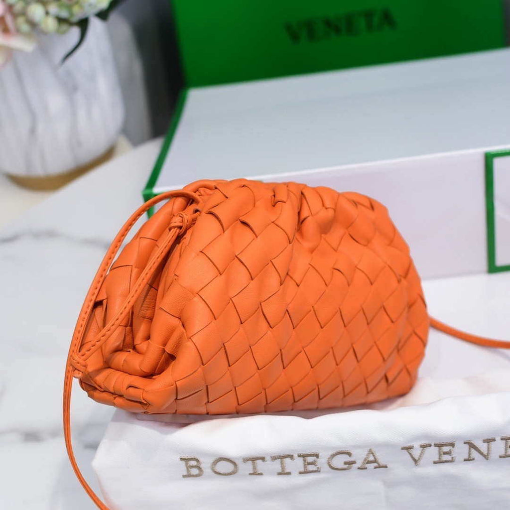 BV 585852 Bottega Veneta Mini Pouch intrecciato leather clutch with strap Orange
