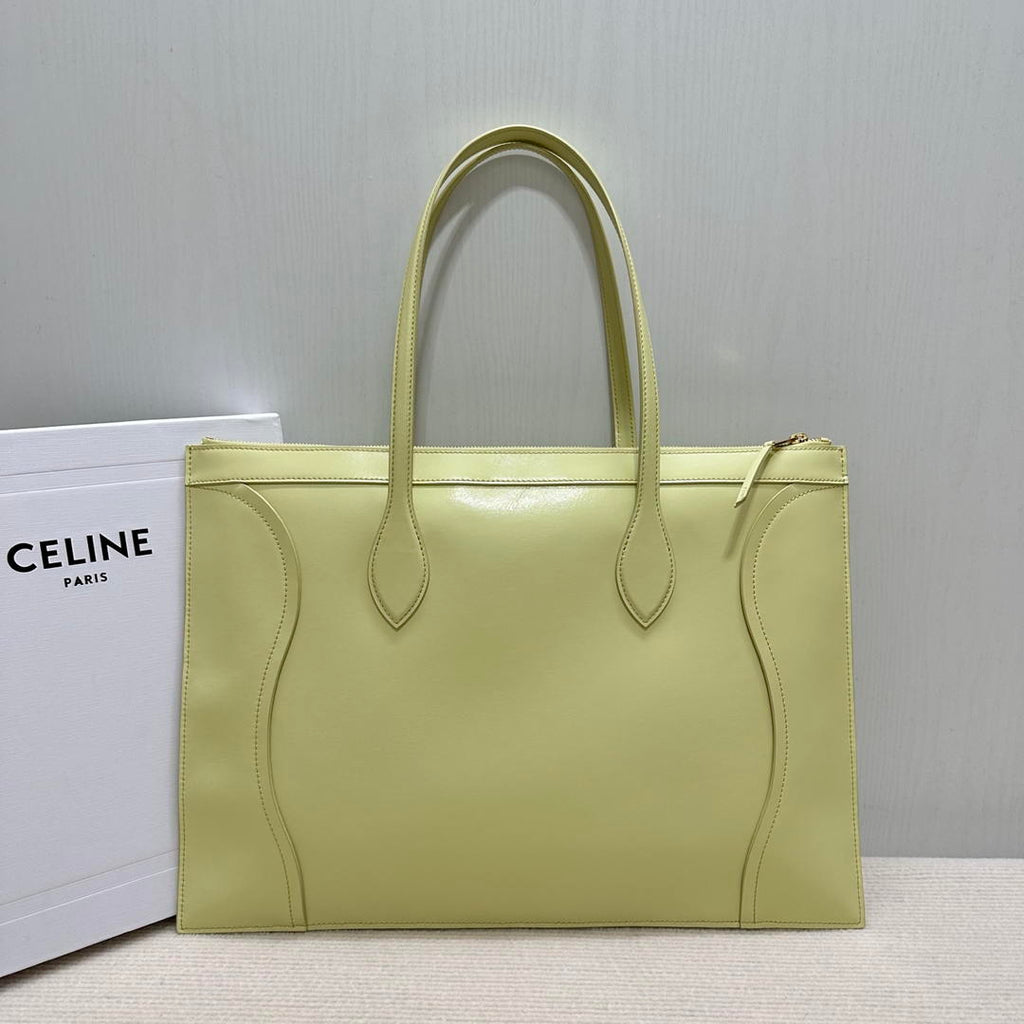 CELINE FLAT LUGGAGE IN GLOSSY CALFSKIN 123963GW4 Light Yellow