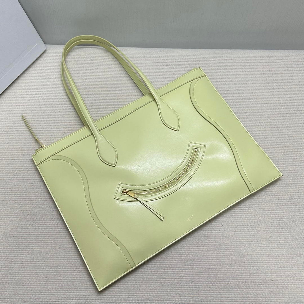 CELINE FLAT LUGGAGE IN GLOSSY CALFSKIN 123963GW4 Light Yellow
