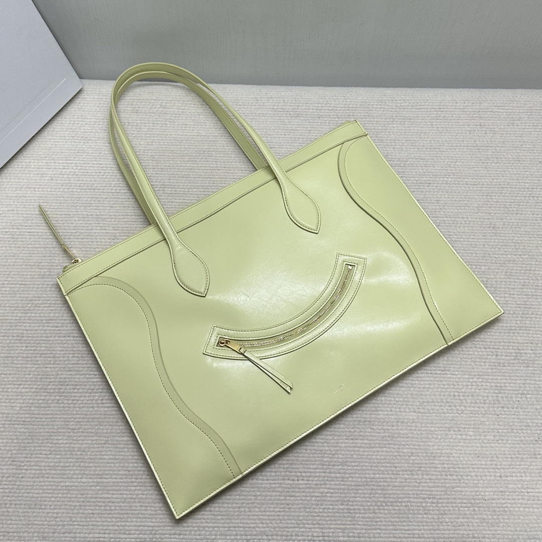 CELINE FLAT LUGGAGE IN GLOSSY CALFSKIN 123963GW4 Light Yellow