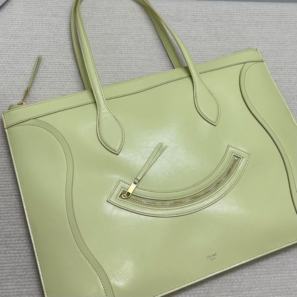 CELINE FLAT LUGGAGE IN GLOSSY CALFSKIN 123963GW4 Light Yellow
