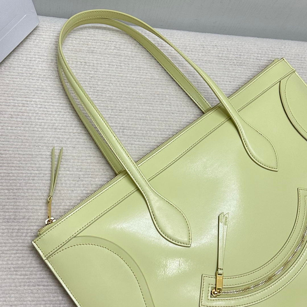 CELINE FLAT LUGGAGE IN GLOSSY CALFSKIN 123963GW4 Light Yellow