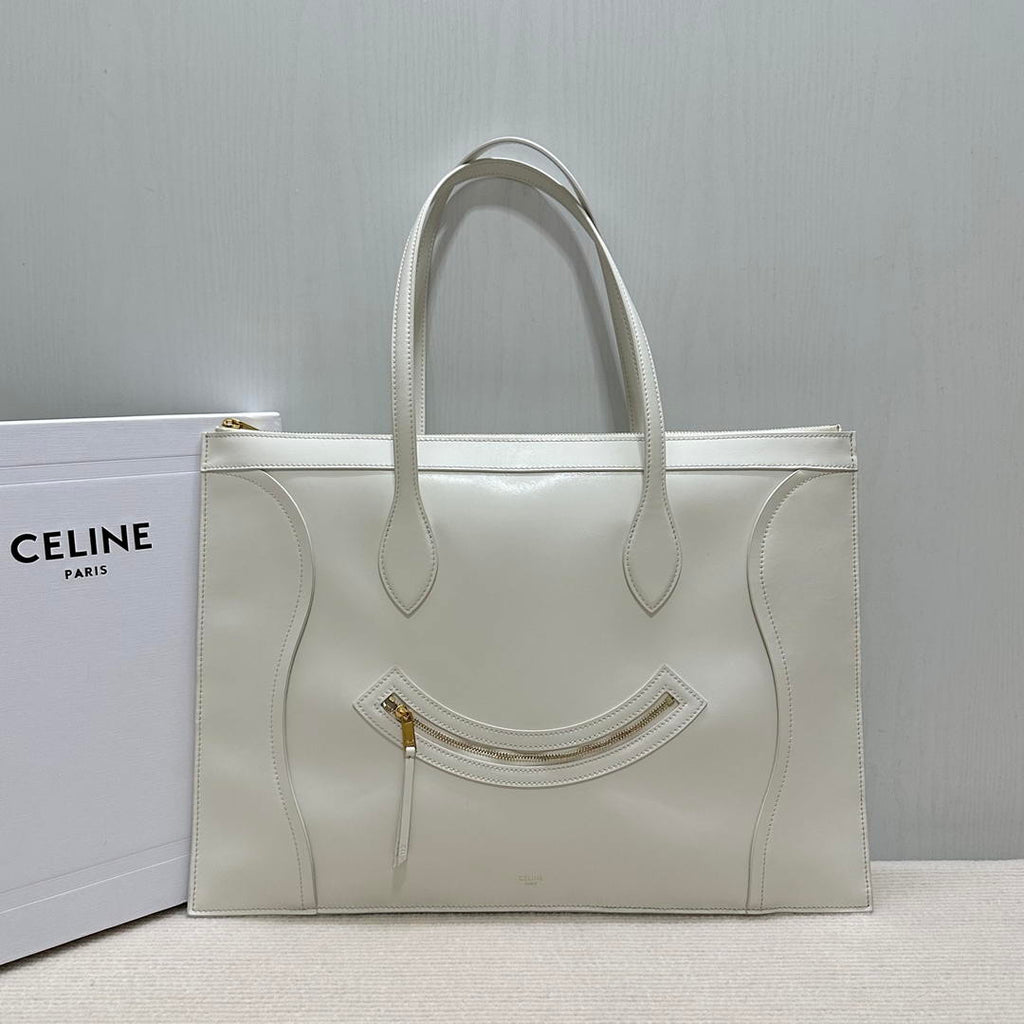 CELINE FLAT LUGGAGE IN GLOSSY CALFSKIN 123963GW4 White