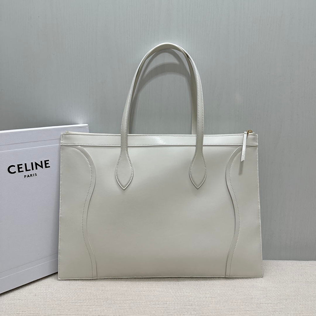 CELINE FLAT LUGGAGE IN GLOSSY CALFSKIN 123963GW4 White