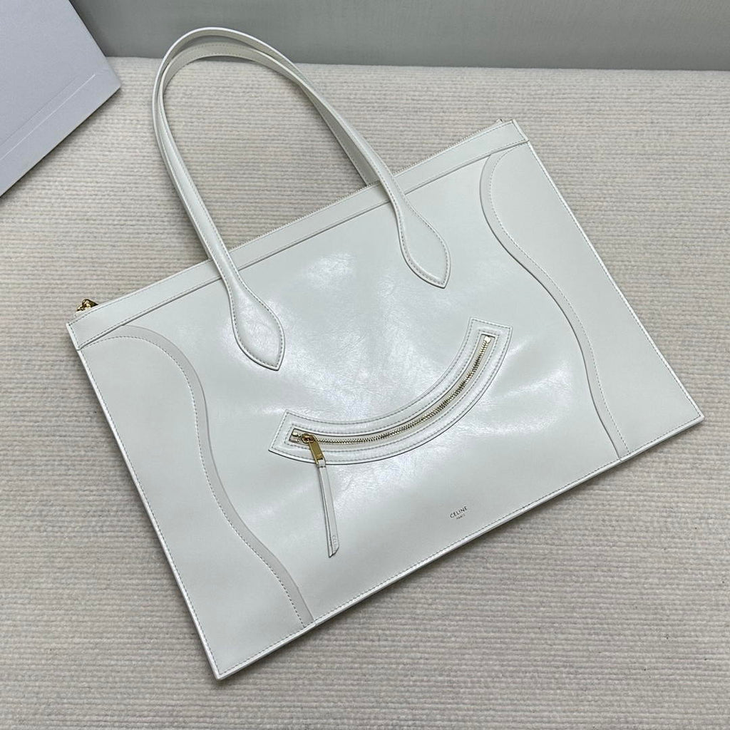 CELINE FLAT LUGGAGE IN GLOSSY CALFSKIN 123963GW4 White