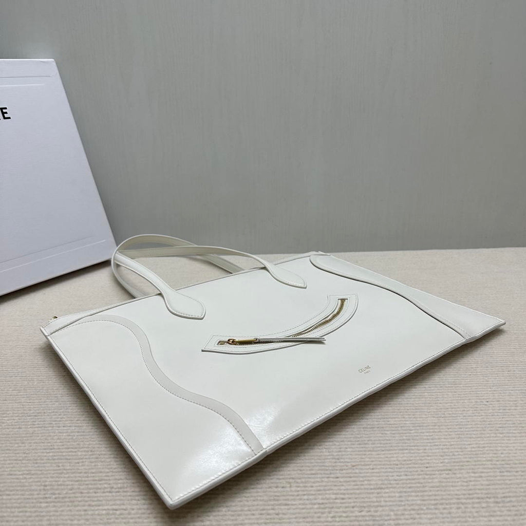 CELINE FLAT LUGGAGE IN GLOSSY CALFSKIN 123963GW4 White