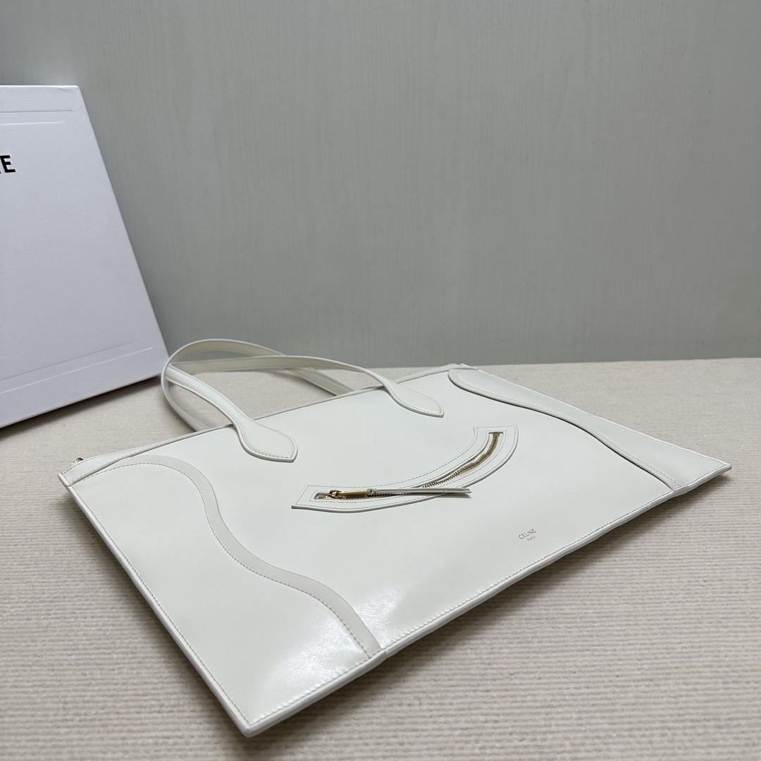 CELINE FLAT LUGGAGE IN GLOSSY CALFSKIN 123963GW4 White