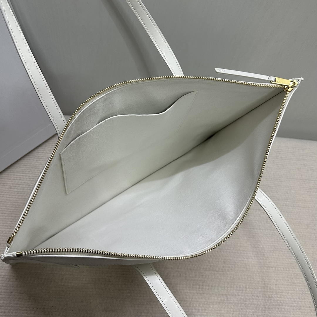 CELINE FLAT LUGGAGE IN GLOSSY CALFSKIN 123963GW4 White