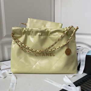 Chanel 22 Bag AS4486 Handbag Shiny Calfskin Yellow With Gold - Default Title - View 1