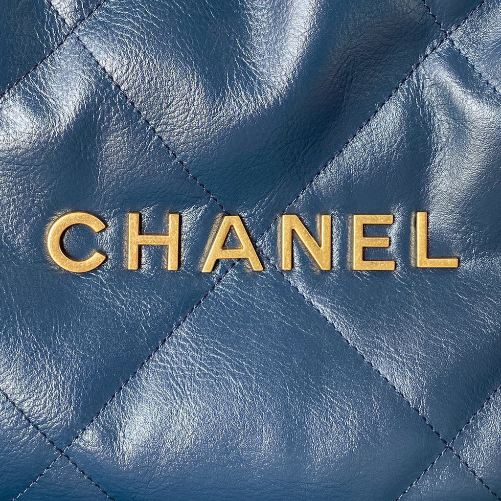 Chanel 22 Handbag AS3261 Shiny Calfskin Gold-Tone Metal Navy Blue