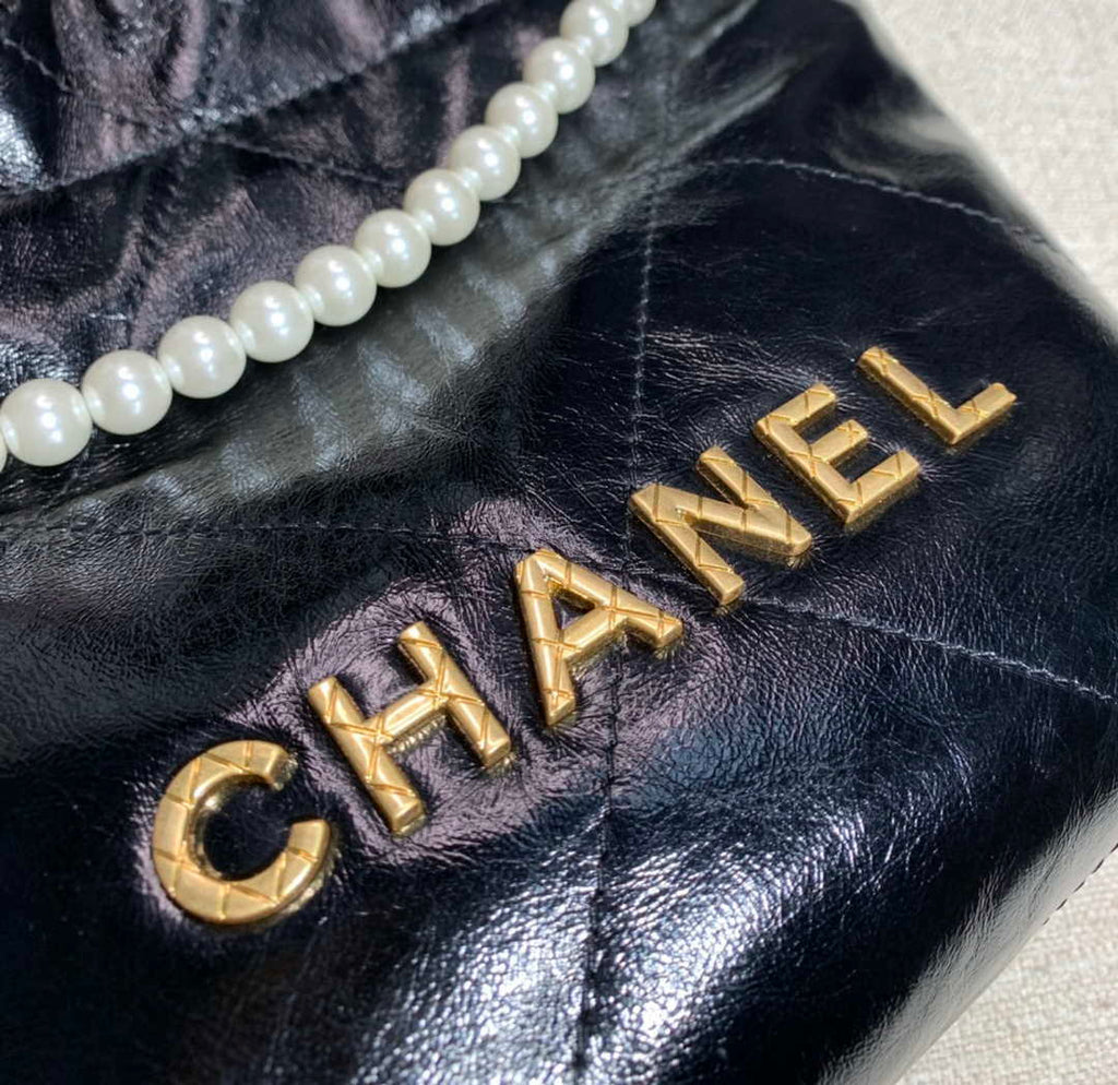 Chanel 22 Mini Handbag Shiny Calfskin AS3260 Pearl Chain Black with Gold
