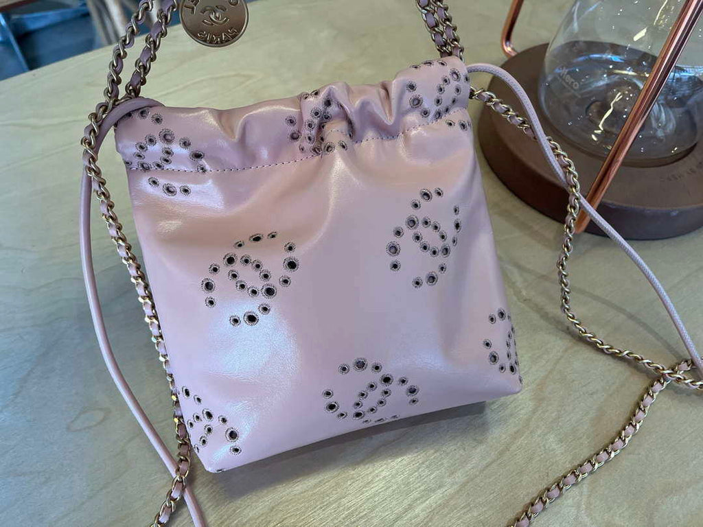 Chanel 22 Mini Handbag  Shiny Calfskin & Gold-Tone Metal AS3980 Pink