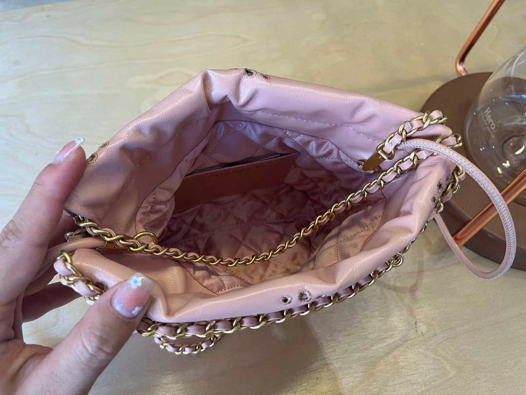 Chanel 22 Mini Handbag  Shiny Calfskin & Gold-Tone Metal AS3980 Pink