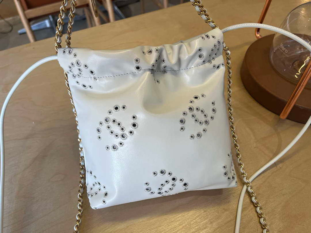 Chanel 22 Mini Handbag  Shiny Calfskin & Gold-Tone Metal AS3980 White