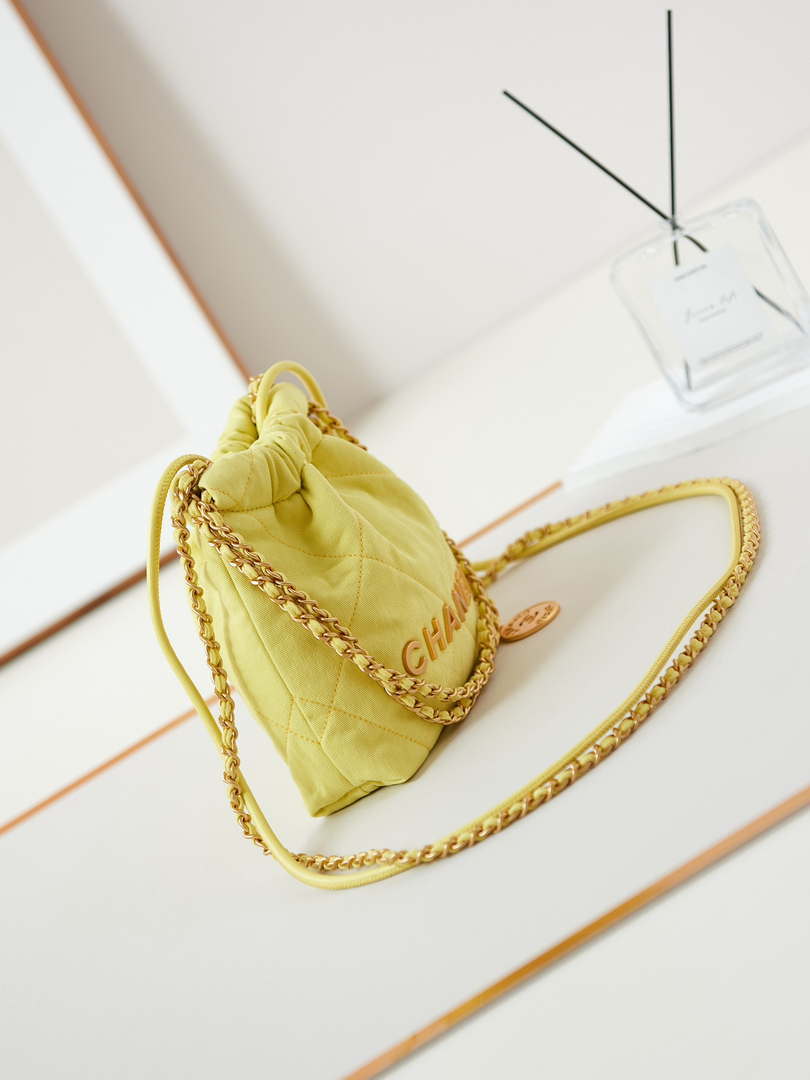 CHANEL 22 Mini Handbag Washed Canvas & Gold-Tone Metal AS3980 Yellow