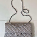 Chanel A01112 Flap Classic 11.12 Handbag Calfskin Sewing Elephant Gray - Gold - View 1