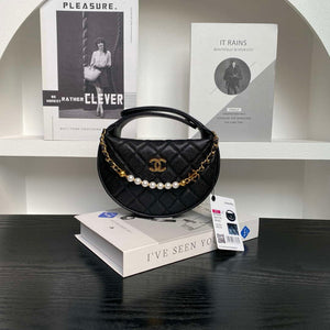 Chanel AP4584 25S  Pouch Grained Black Calfskin Imitation Pearl Gold - Default Title - View 1