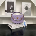 Chanel AP4584 25S  Pouch Grained Purple Calfskin Imitation Pearl Gold - Default Title - View 1