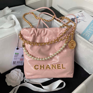 Chanel AS3980 22 Mini Handbag Shiny Calfskin & Gold-Tone Metal Pink - Default Title - View 1
