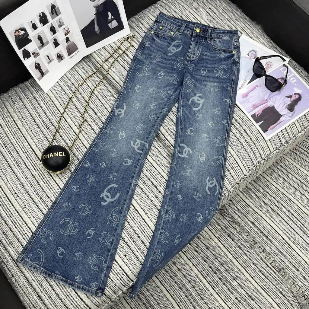 Chanel Women Double C logo print flared denim trousers Jeans C58813