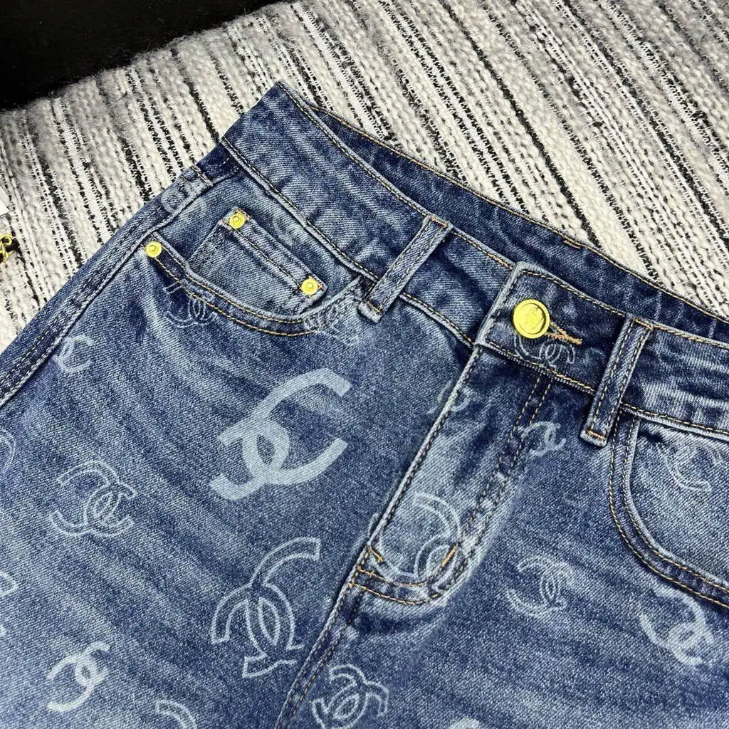 Chanel Women Double C logo print flared denim trousers Jeans C58813