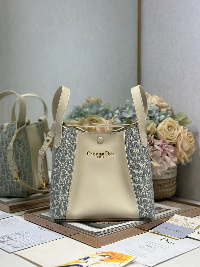 Dior  M2840 Small Signature Bucket Bag Blue Dior Oblique Chambray with Raffia Effect and Light Biscuit Smooth Calfskin