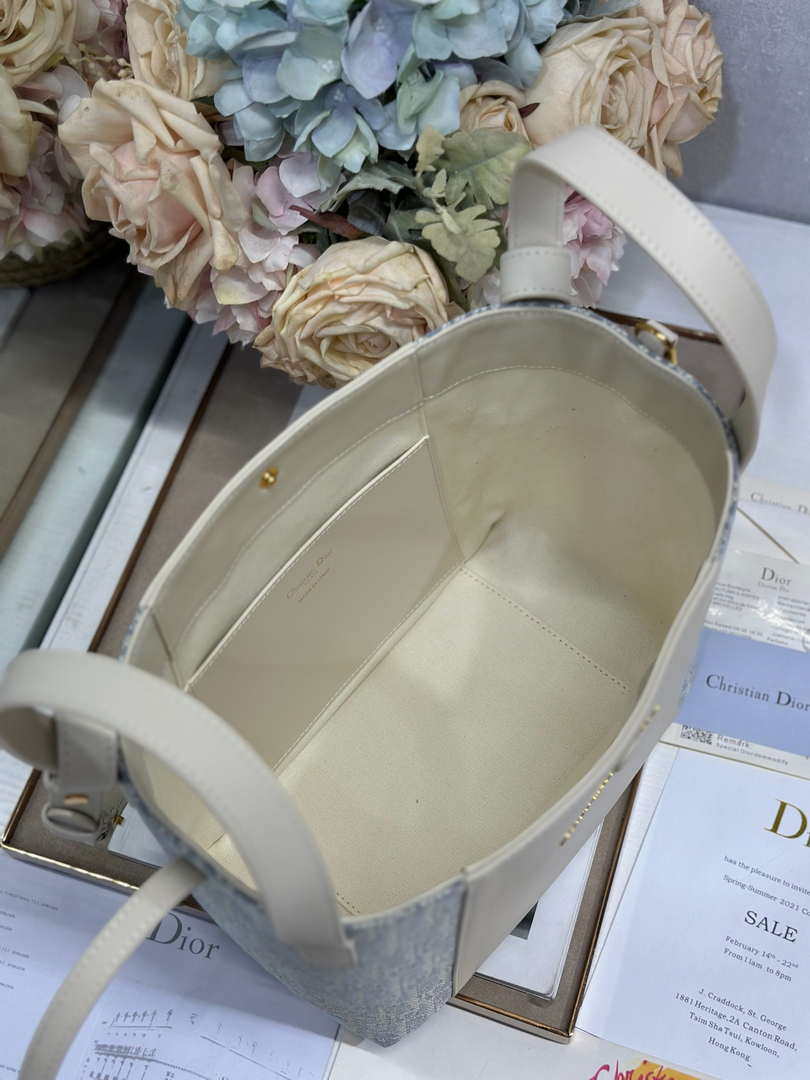 Dior  M2840 Small Signature Bucket Bag Blue Dior Oblique Chambray with Raffia Effect and Light Biscuit Smooth Calfskin