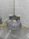 Dior S2374 30 Montaigne Mini Bucket Bag with Drawstring Blue Dior Oblique Chambray with Raffia Effect and Light Biscuit Smooth Calfskin