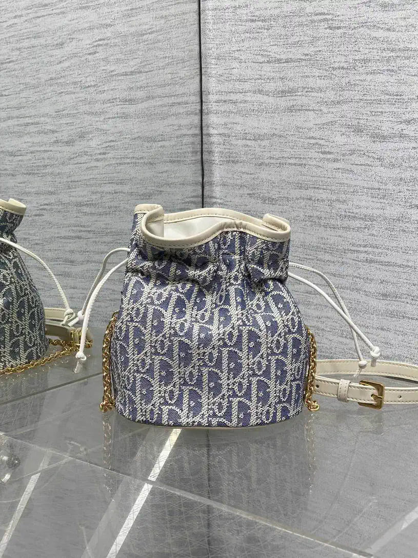 Dior S2374 30 Montaigne Mini Bucket Bag with Drawstring Blue Dior Oblique Chambray with Raffia Effect and Light Biscuit Smooth Calfskin