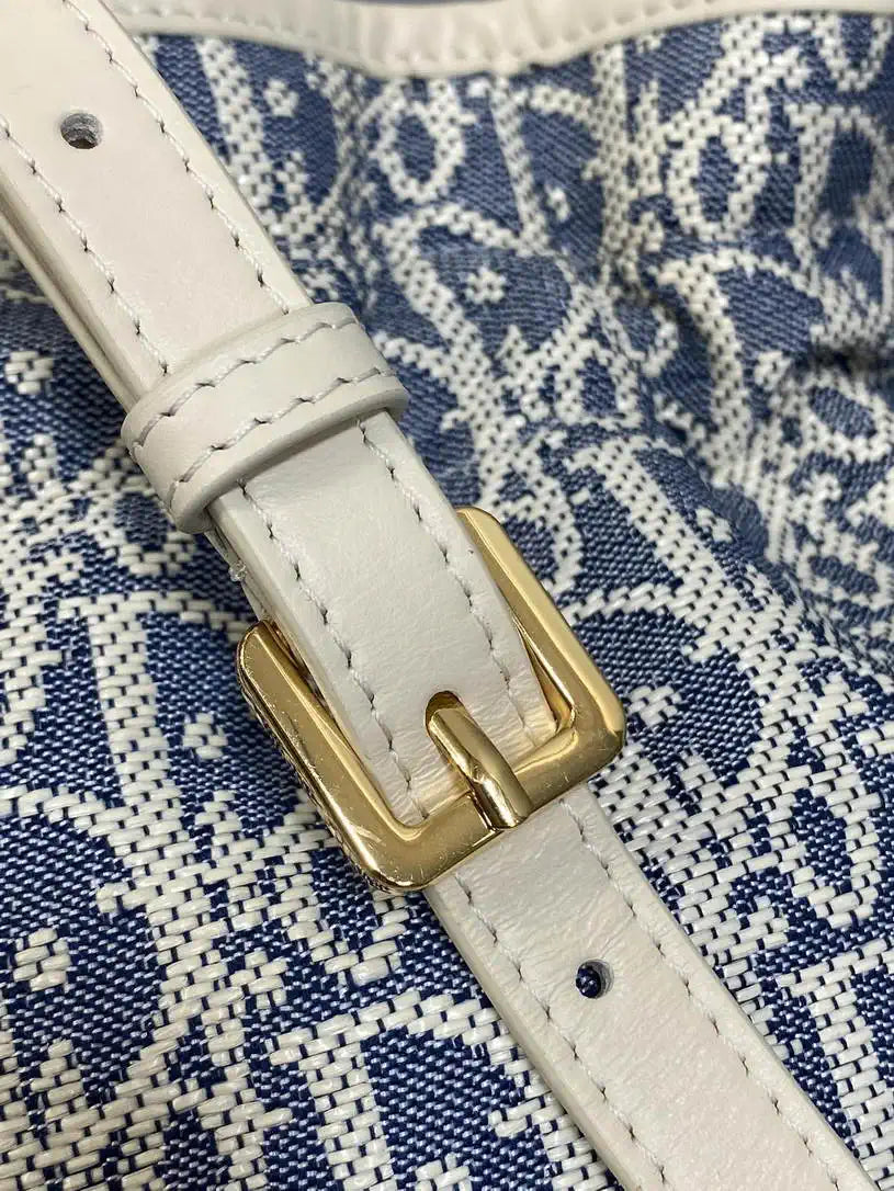 Dior S2374 30 Montaigne Mini Bucket Bag with Drawstring Blue Dior Oblique Chambray with Raffia Effect and Light Biscuit Smooth Calfskin