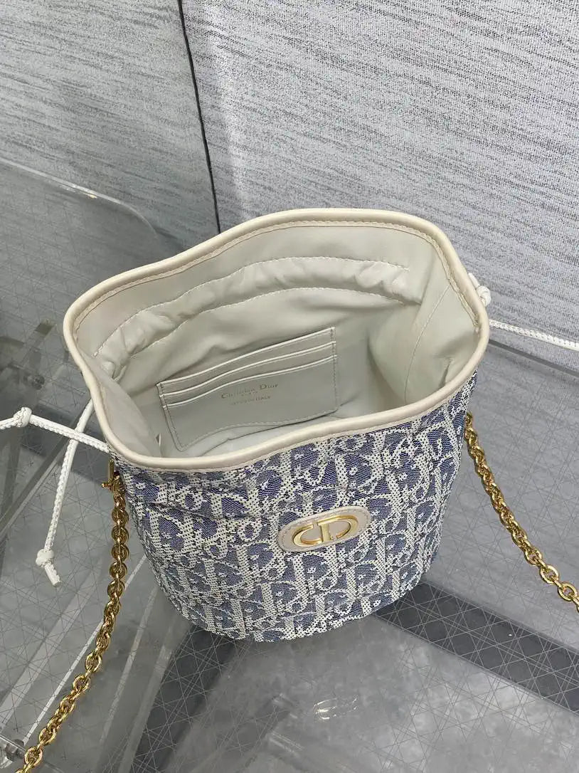 Dior S2374 30 Montaigne Mini Bucket Bag with Drawstring Blue Dior Oblique Chambray with Raffia Effect and Light Biscuit Smooth Calfskin